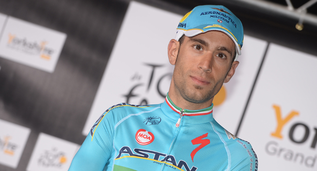 Photo: Nibali launches a smart attack after the final climb of the second Tour de France stage and holds off his chasers by two seconds to take both the stage victory and the yellow jersey... 